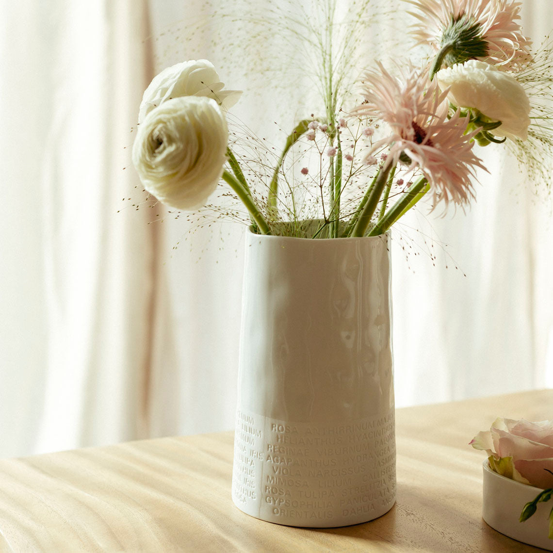A Poetic Space White Porcelain Flower Vase with Embossed Flower Names Decoration product image