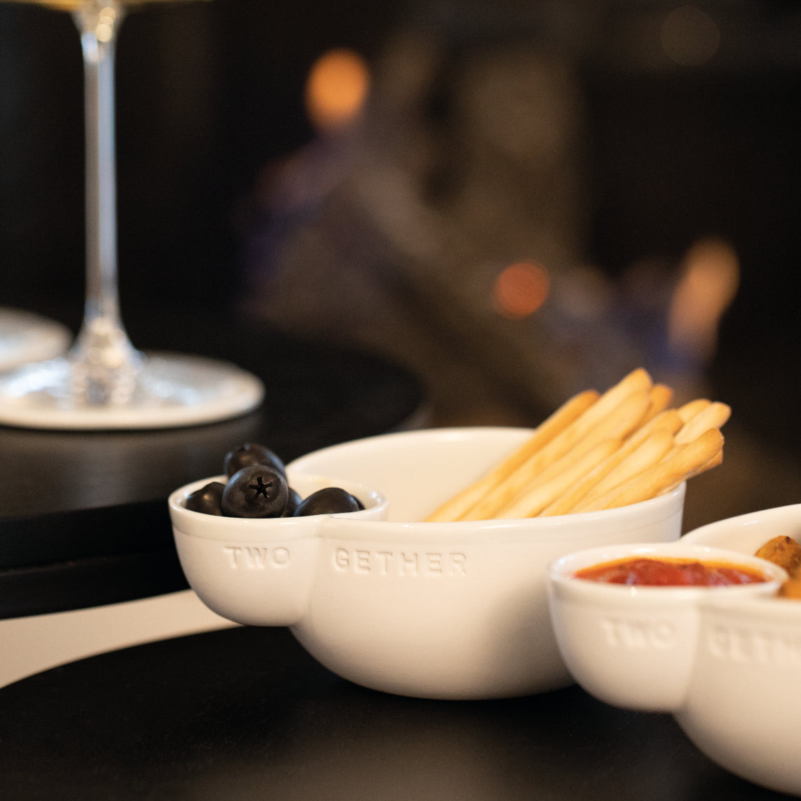 Two Gether porcelain dishes with food